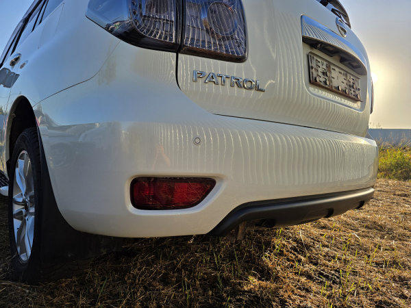 Бампер задний Nissan Patrol 6 поколение (Y62), 2010 - 2017
